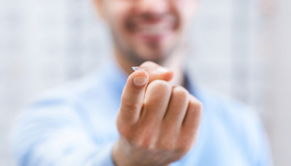 Vision,Correction,Concept.,Closeup,Of,Unrecognizable,Guy,Showing,Contact,Eye