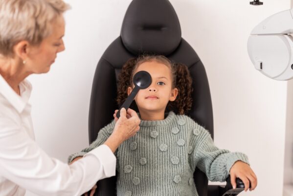 Eye,Exam,,Child,And,Optometrist,Testing,Eye,Sight,For,Glasses,